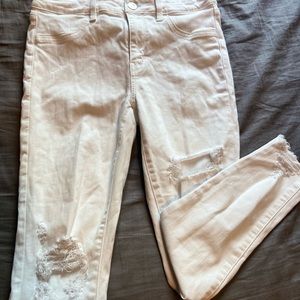 Distressed white high waisted skinny jeans